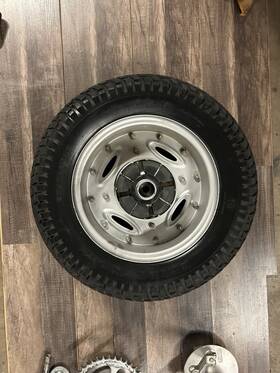 64111-28001 Suzuki 1976 Rv125 Rear Wheel Assembly With Brake Sprocket Axle Adjusters Oem