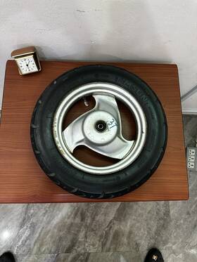 A076979 Yamaha Vino Yj 50 Oem Rear Front Wheel Tire With Rim