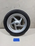 2005 Yamaha Majesty YP400 Front Wheel And Tire #925.2-33. Fixed Price $100.00.