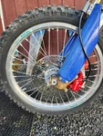 Husqvarna 2003-20012 Wheels Complete Tires Rotors Sprockets Great Shape. Fixed Price $600.00.