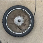 Honda 1977 XL75 Front Wheel. Fixed Price $70.00.