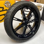 Oem 00-26 Harley Touring 18" Black Slicer Front Wheel And Tire Impeller. Fixed Price $599.95.