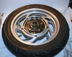1989 Honda Pacific Coast Rear Wheel Rim Mag Dunlop Tire. (PC-84). Fixed Price $148.00.