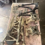 08 Honda TRX700XX Oem Rear Control A-arms Hubs Rotors Atv. Fixed Price $299.00.