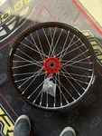 Tusk Impact Complete Wheel - Front 21 X 1.60 Black Rim/silver Spokes/red Hub. Fixed Price $167.00.
