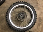 82 Suzuki PE-175 Rear Wheel, 64110-14400. Fixed Price $125.00.