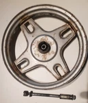 Yamaha Riva CA50 Front Wheel 1984 Spoke 10IN With Axle Spacer And Castle Nut. Fixed Price $40.00.