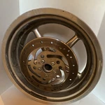Harley-davidson Genuine Rear Wheel 2009 Softail FXCWC1580 Rocker. Fixed Price $250.00.