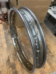 Honda 90 Rim Has Surface Rust Chrome Is Somewhat Gone But No Holes Thru. Fixed Price $20.00.