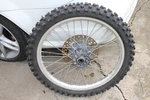 1987 Kawasaki Front Wheel Rim & Tire Assy 41090-1051. Fixed Price $125.00.
